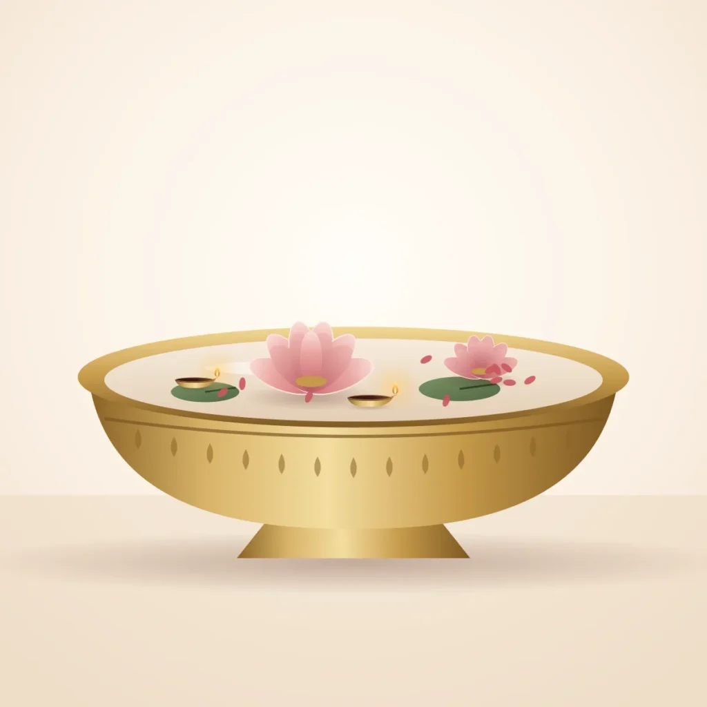 Brass-finish lotus urli bowl with floating lotus flowers and diyas